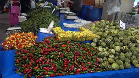 Izmir, Turkey - 22nd of October, 2016:  4K Karsiyaka farmers' market - Fresh vegetables for pickling on sale
