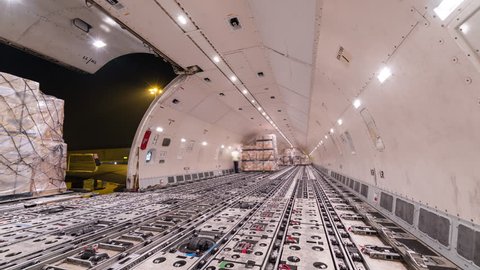 Loading air cargo freighter inside aircraft