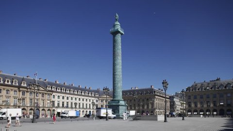 PARIS, FRANCE - August 23, 2016: Statue of Napoleon at top of Vendome column, in Vendome square in Paris with surrounding buildings. Time-lapse sequence. (Ultra High Definition, Ultra HD, UHD, 4K, HD)
