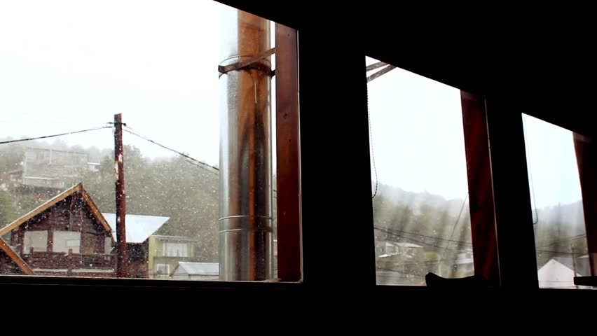 Snowstorm Seen Through House Window, Blizzard Over Residential Area, Ushuaia, Argentina 