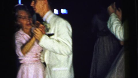CAMDEN, NEW JERSEY 1964: older woman and younger man on a formal dance floor