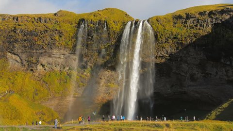 Seljalandsfoss is one of the best known waterfalls in Iceland, view in sunny autumn day