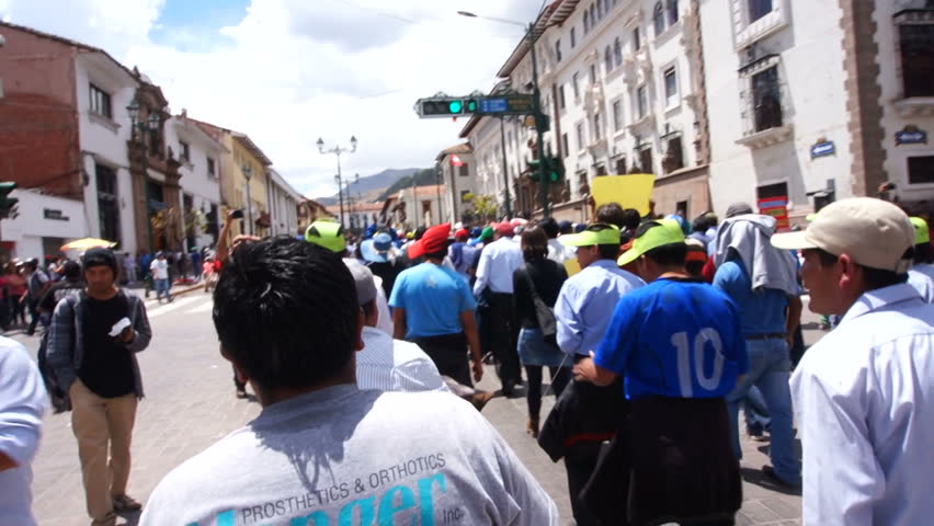 Protesters march in the street peacefully in Cusco, Peru.