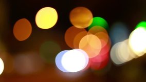 Christmas street illumination. Defocused city lights. Blurred night traffic lights - Powered by Shutterstock - Get 15% off with code: PIKWIZARD15