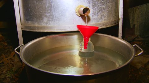 Baking domestic brandy in the cauldron