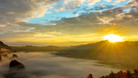 (4k) Time lapse, Landscape of Morning Mist with Mountain Layer at Phu Lanka National Park, Phayao province, north of Thailand. Camera zoom out.