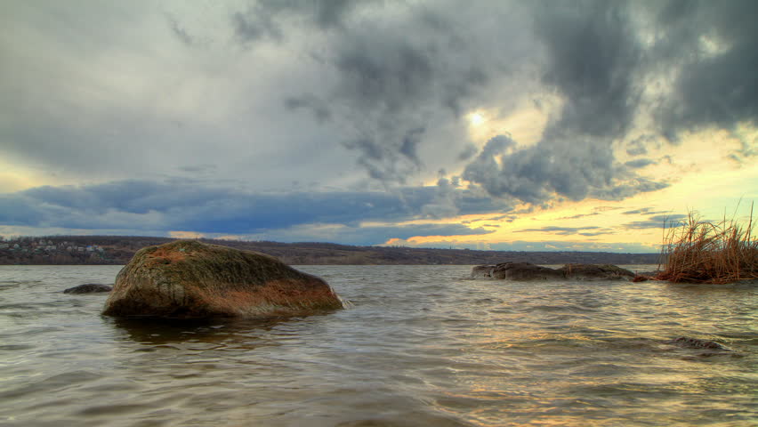 timelapse landscape of granite bank of the river.
