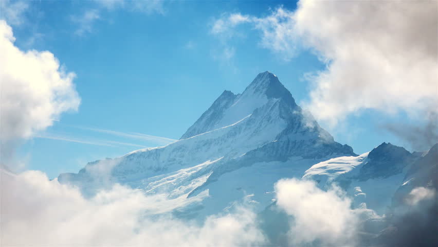 Amazing Mountain Landscape. Famous Mount Eiger in Clouds. Grindelwald, Switzerland. 4K Ultra HD 3840x2160 Video Clip.