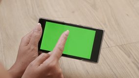 Young woman holds greenscreen smart phone 4K 2160p 30fps UltraHD footage - In female hands green screen tablet display 3840X2160 UHD video
