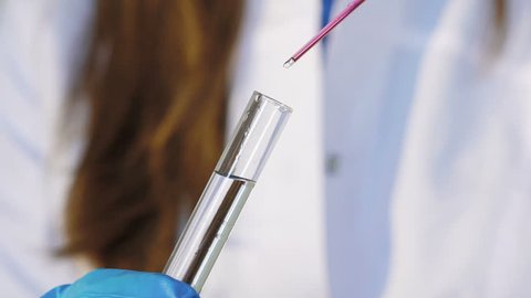 Red substance dripping in a test tube