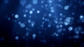 Blurred lights and sparkles on the dark blue background. Seamless loop animation. This clip is available in multiple other color options - check my portfolio.