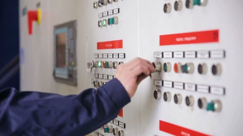 Control cabinets, displays at an electrical substation at power plant, factory.
