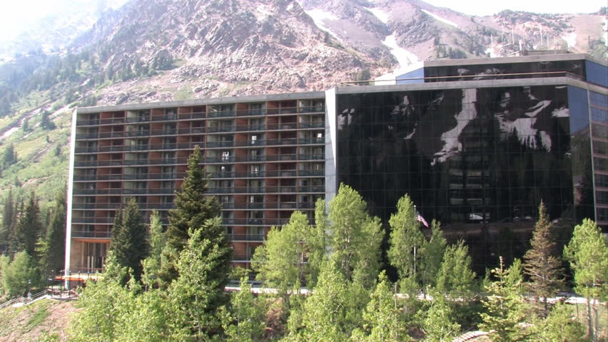 Pan of condominium resort in high Wasatch Mountain valley of Alta and Snowbird Utah.  Outside of Salt lake City, Utah. Luxury residence, timeshare, hotel and resorts for the rich and famous. 