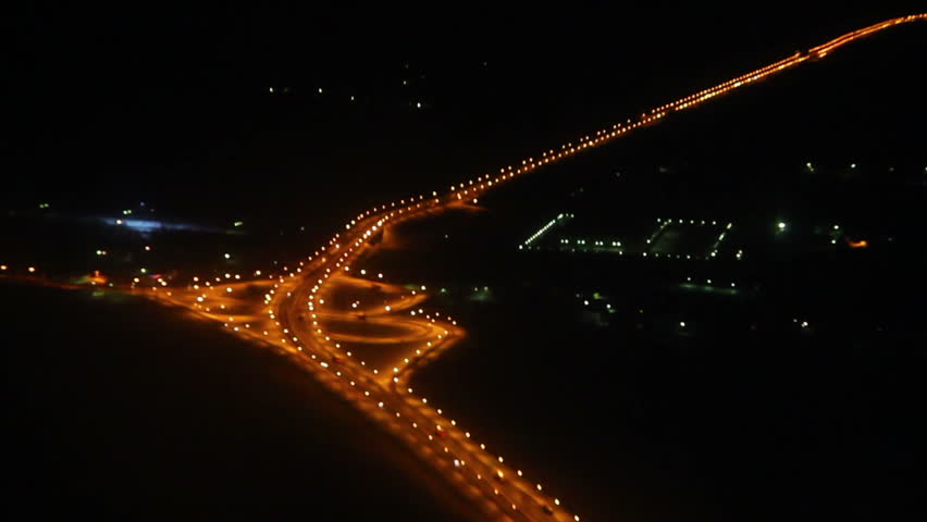 Night view on roads from the height - from flying aircraft