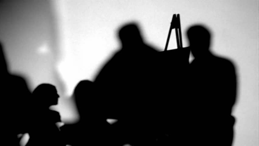 Silhouette of painter painting