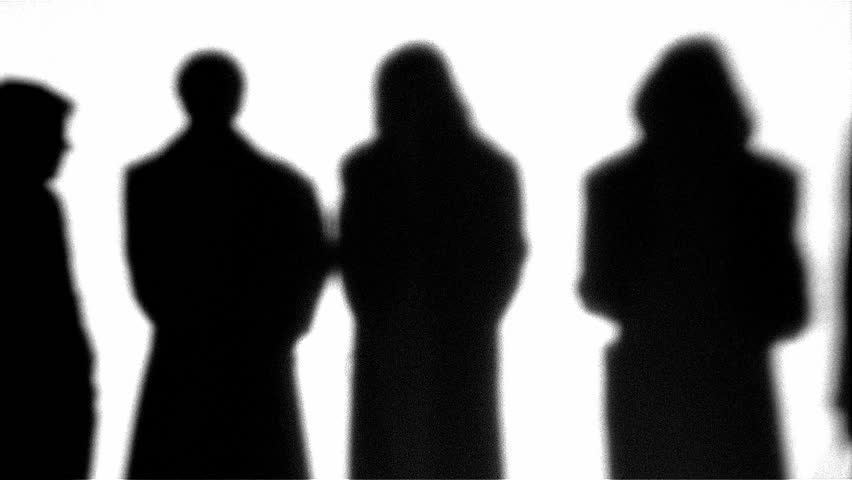 Silhouette of people standing in line