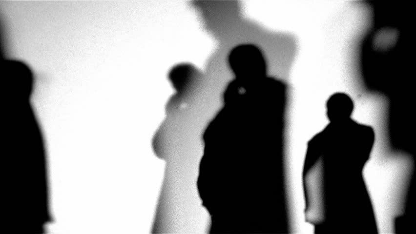 Silhouette of group of people on cellphones