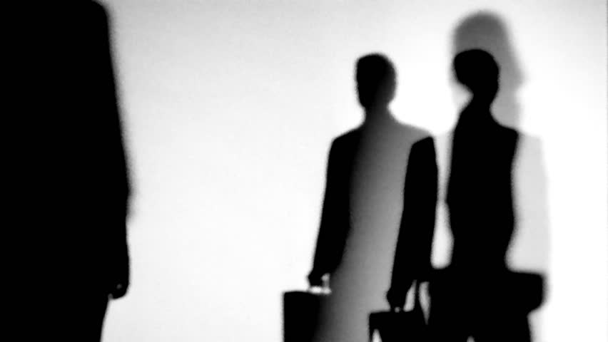Silhouette of businessmen standing