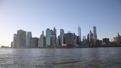 view of Manhattan across the water. Manhattan. view of Manhattan in good weather.

