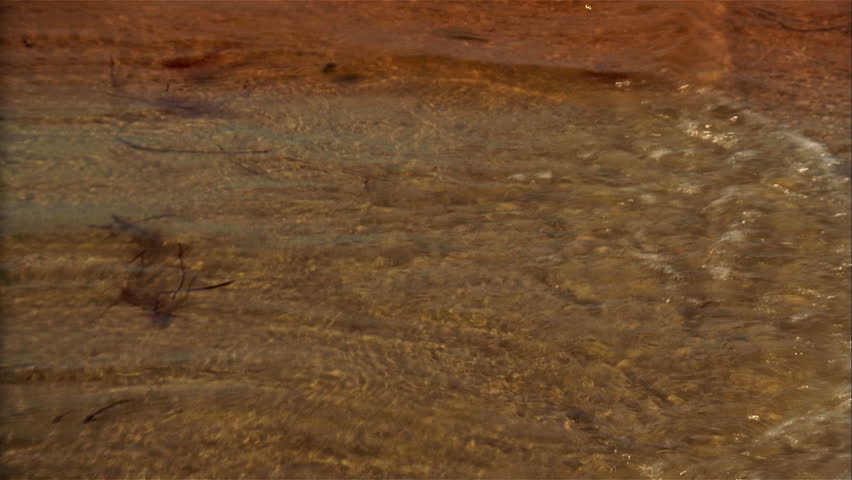 Waves over a beach