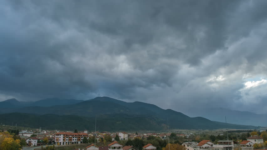 The ski resort on the background of the beautiful mountain. Wide angle. Time lapse