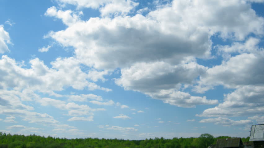 timelapse with clouds moving over forest

