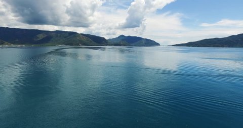 Camera moves back and show beautiful seaspace and mountains in Turkey, Marmaris. Aerial view shooting with drone.