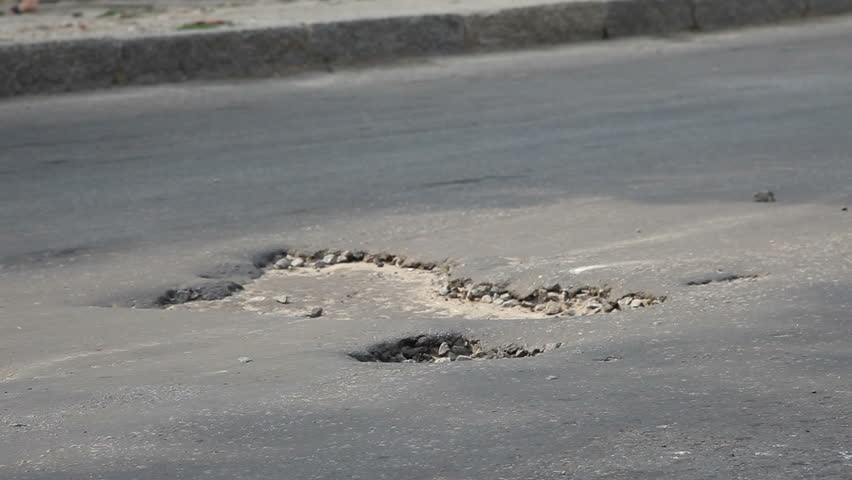 Pothole Stock Video Footage - 4K And HD Video Clips | Shutterstock