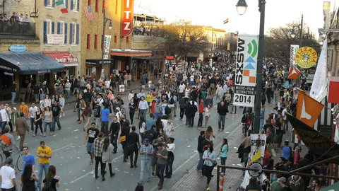 AUSTIN, TEXAS CIRCA MARCH 2014 - Time lapse shot people walking at sunset on 6th Street during SXSW music festival 