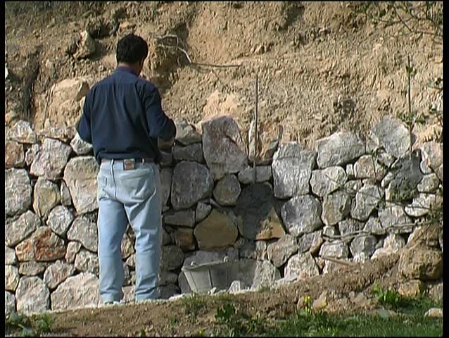 Stone wall building