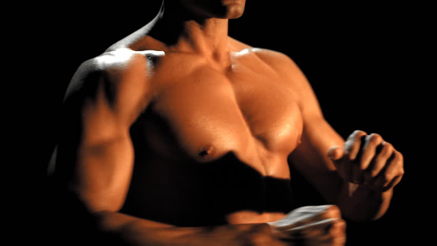 Male torso spins arm