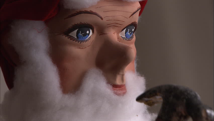 Closeup of Christmas puppet hammering