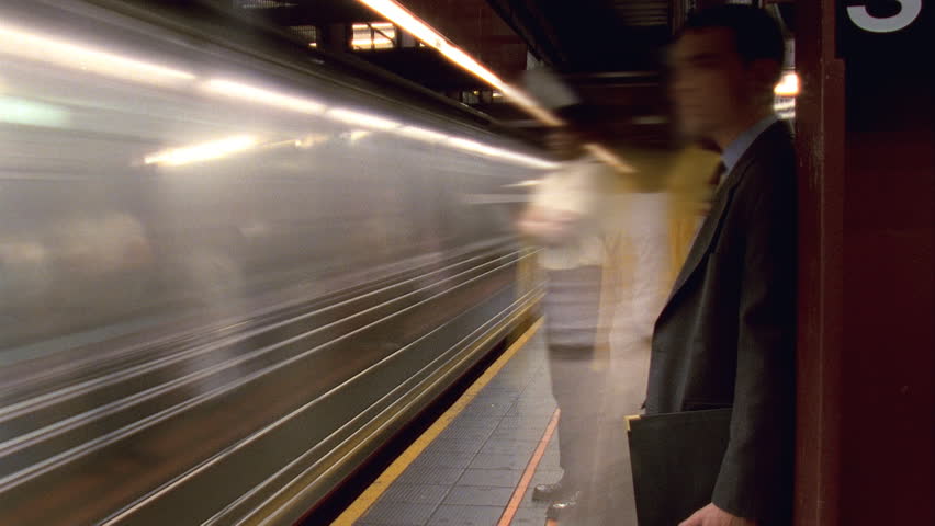 NEW YORK - CIRCA 2003: Timelapse of people waiting for trains in the 14th Street