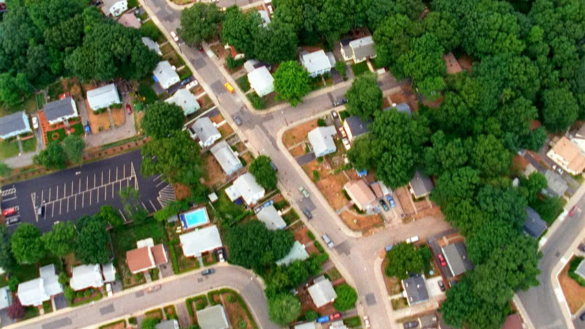 Aerial view of residential homes and cemetary