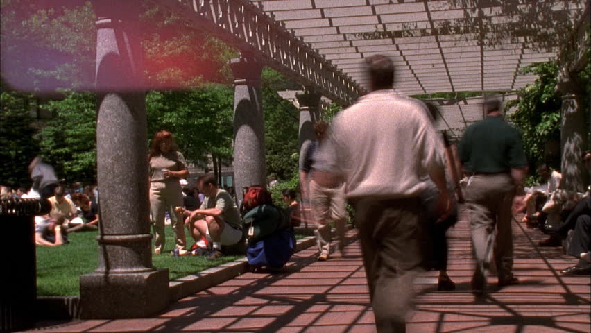 BOSTON - CIRCA 2001: Unidentified people walking in a Boston park circa 2001.