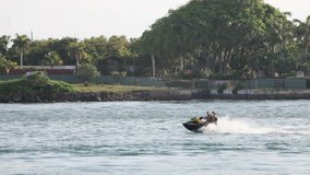 a couple on a waverunner in Miami Beach