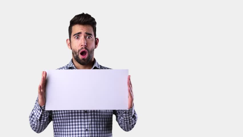 surprised young man holding a banner
