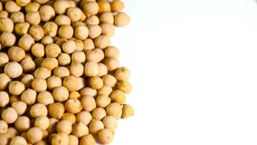 Rotating raw chickpea beans, vegan healthy nutrition.