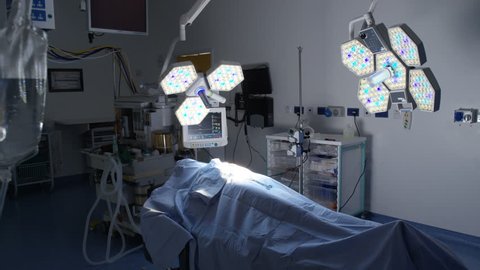 4K Time lapse team of surgeons in operating theater performing operation on a pa (UK-Oct 2016)