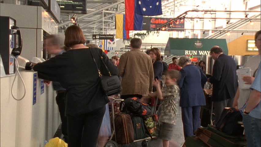 BOSTON - CIRCA 2001: Unidentified travelers in Boston's Logan Airport circa 2001