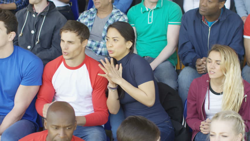4K Sports crowd expressing disappointment, watching live game in stadium (UK-Oct 2016)