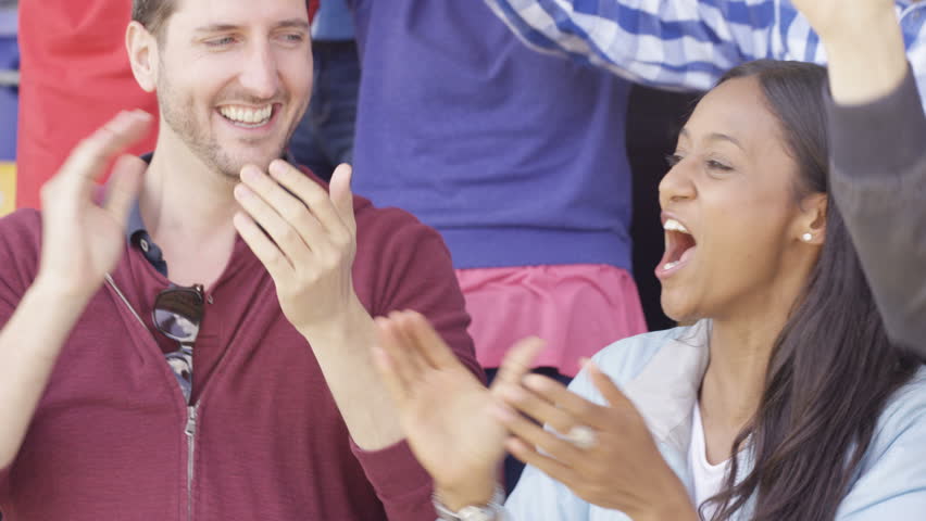 4K Excited sports fans at live game chanting and cheering for their team (UK-Oct 2016)