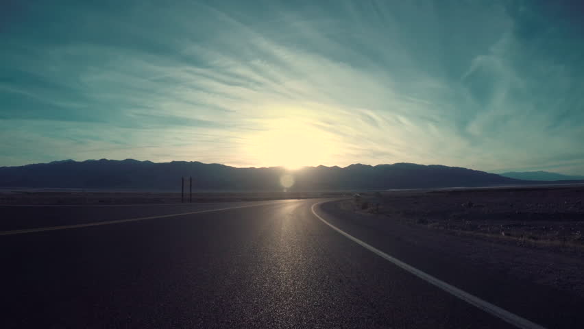 Driving Down Desert Road In Death Valley, CA Royalty-Free Stock Footage #21610621