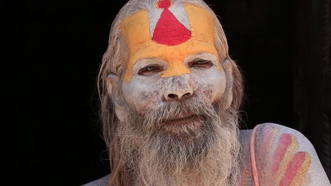 KATHMANDU, NEPAL - OCTOBER 25, 2016 : Portrait of Shaiva sadhu, holy man in Pashupatinath Temple, Nepal