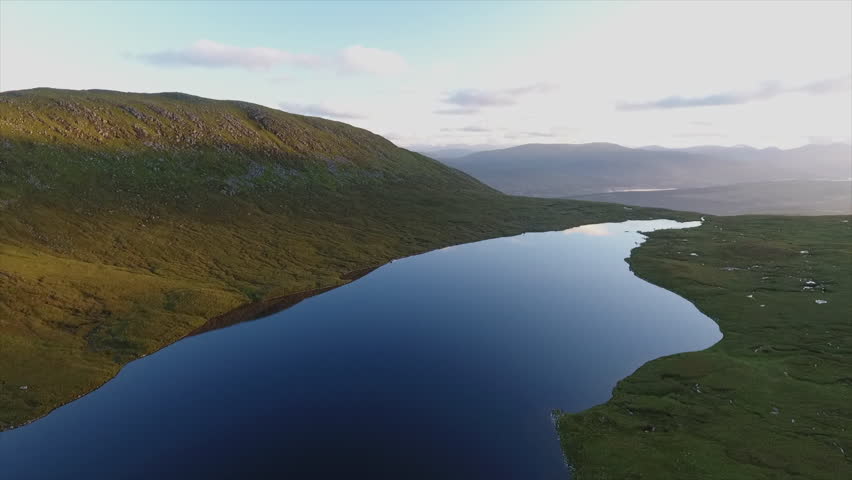 Mountain Lake Reflections at Sunrise Aerial View 