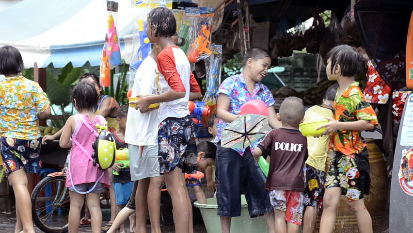 BANGKOK - APRIL 13: Children enjoying the annual Songkran festivities with a