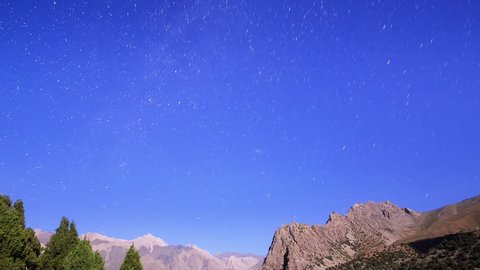 Night in the mountains Traces of stars similar to metory time lapse Pamir, Tajikistan.