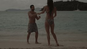 honeymoon couple slow dancing on the beach in St John, United States Virgin Islands