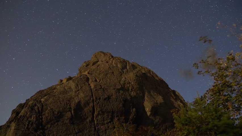 Stars spin over haystack rock on the summit of Mount Si