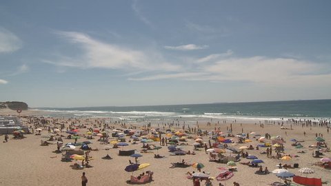 People enjoying the beach in summer